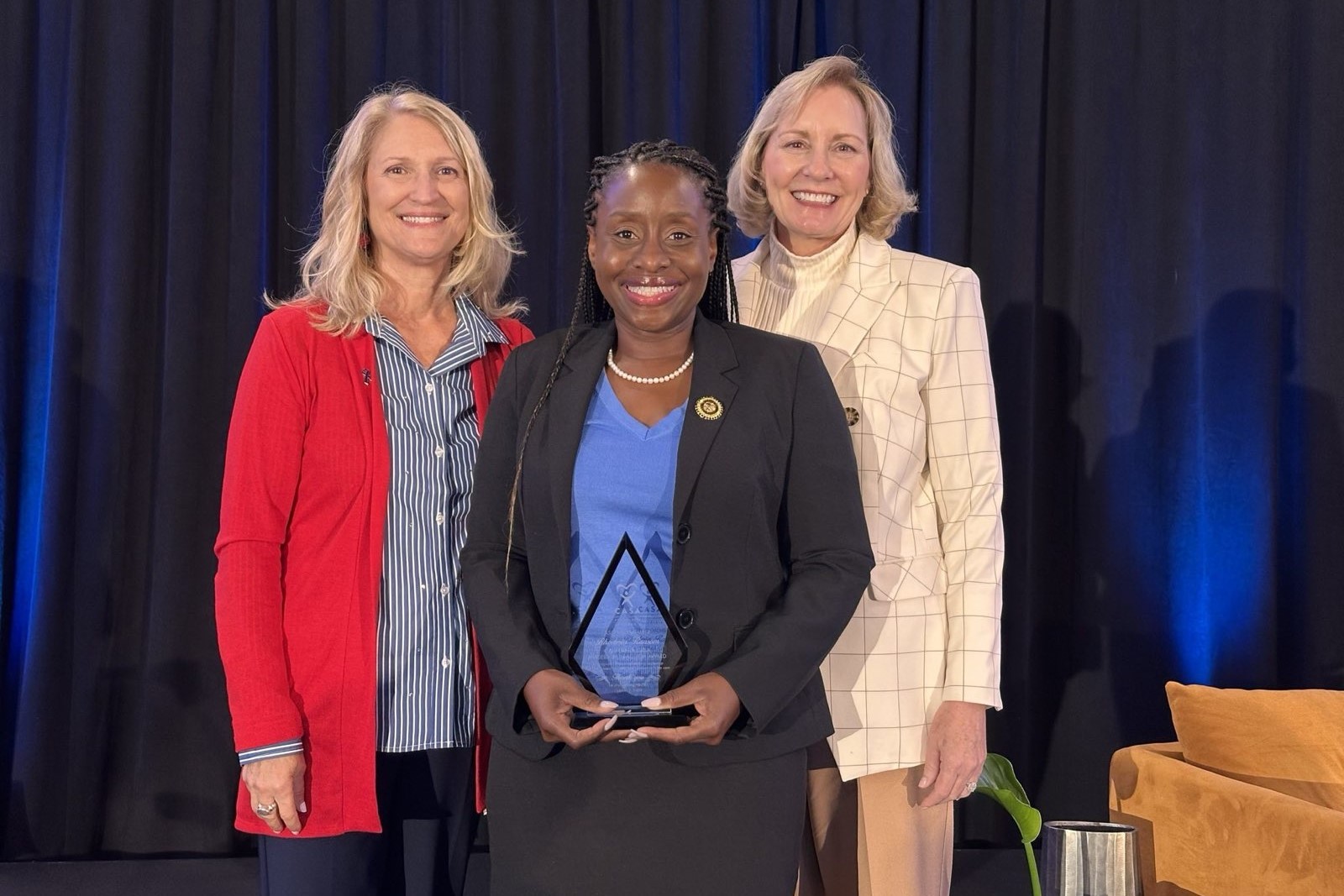 Assemblymember Rhodesia Ransom receiving an award for her leadership in protecting foster youth from the California Court Appointed Special Advocates (CASA).
