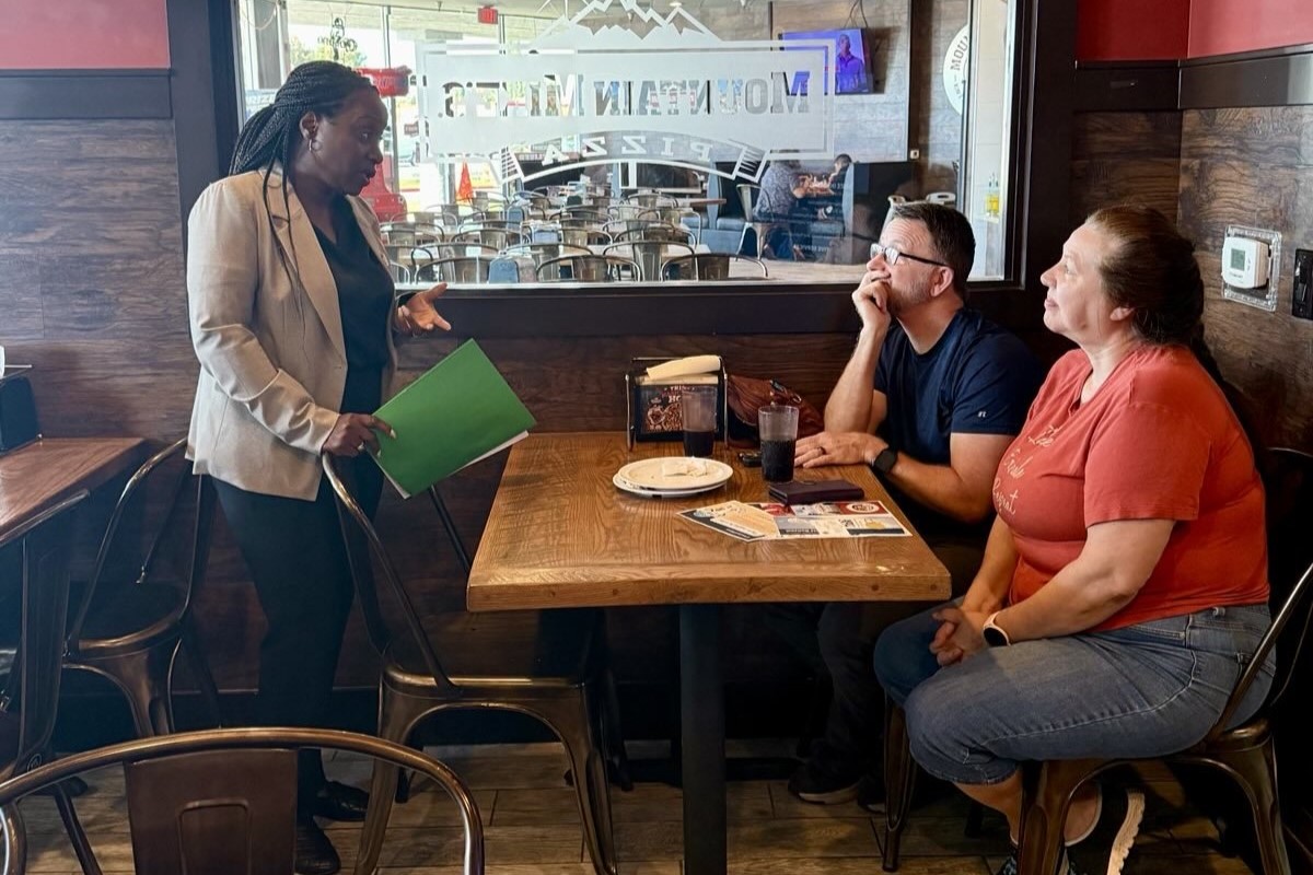 Assemblymember Rhodesia Ransom meeting with constituents at her pizza meet and greet in Stockton, CA.