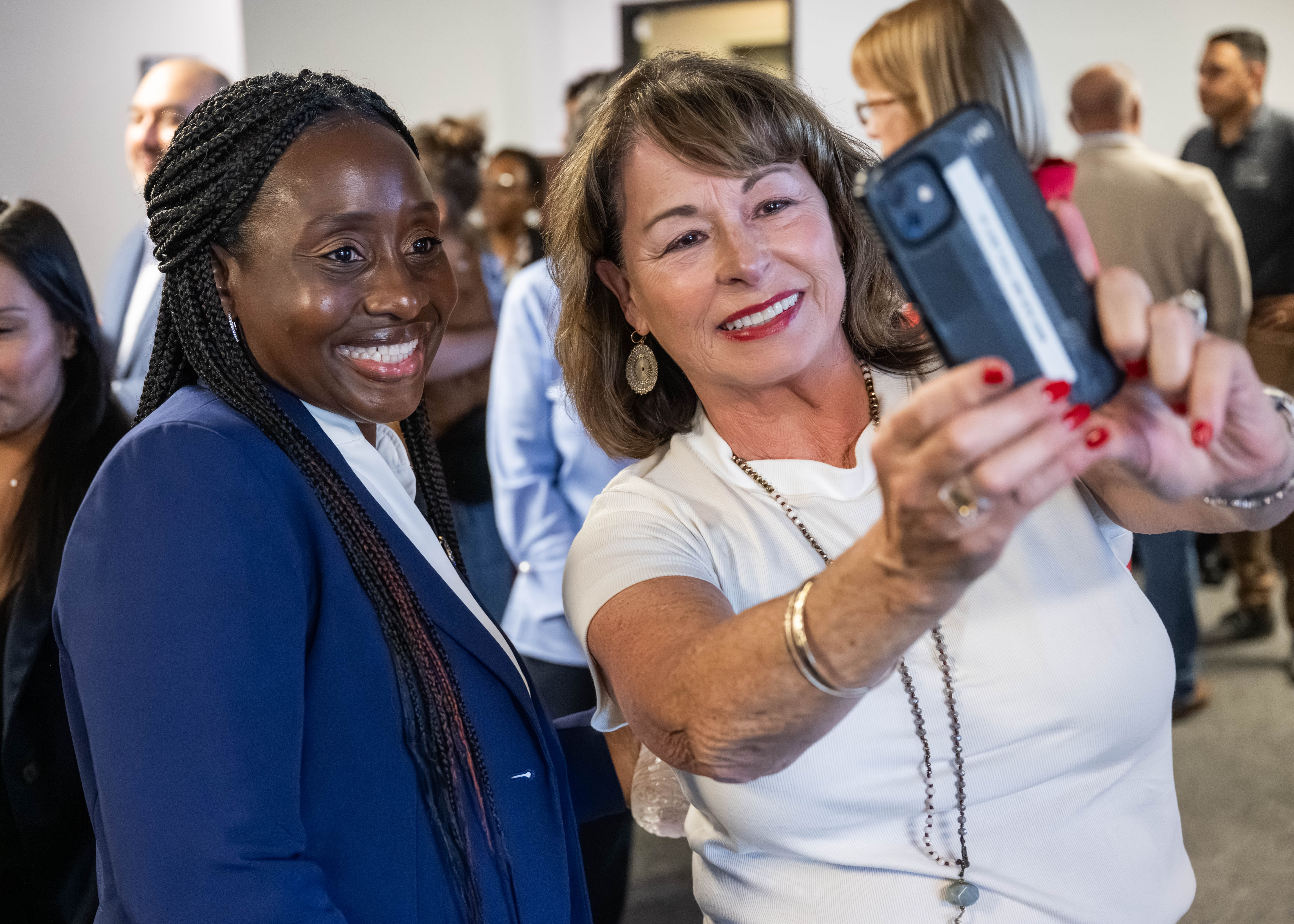 Assemblymember Rhodesia Ransom and a constituent taking a selfie during her Summer Open House in Stockton, CA.