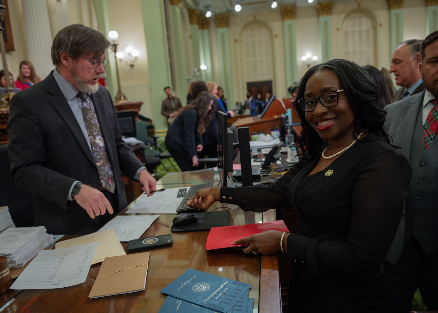 Assemblymember Rhodesia Ransom turning in her first-ever bill.