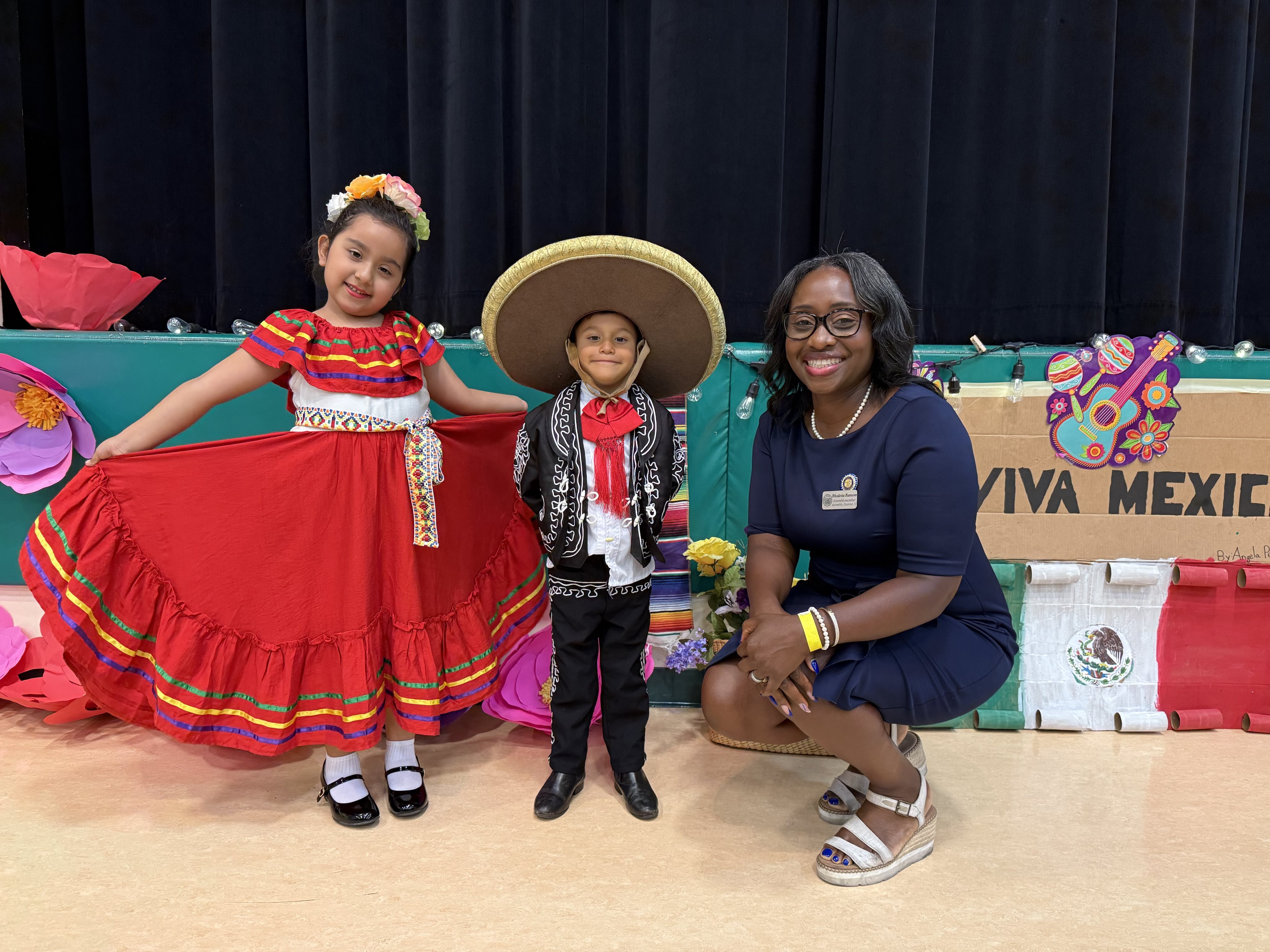 [Photo 5] Assemblymember Rhodesia Ransom with French Camp elementary students during their Hispanic Heritage Month celebration ceremony.