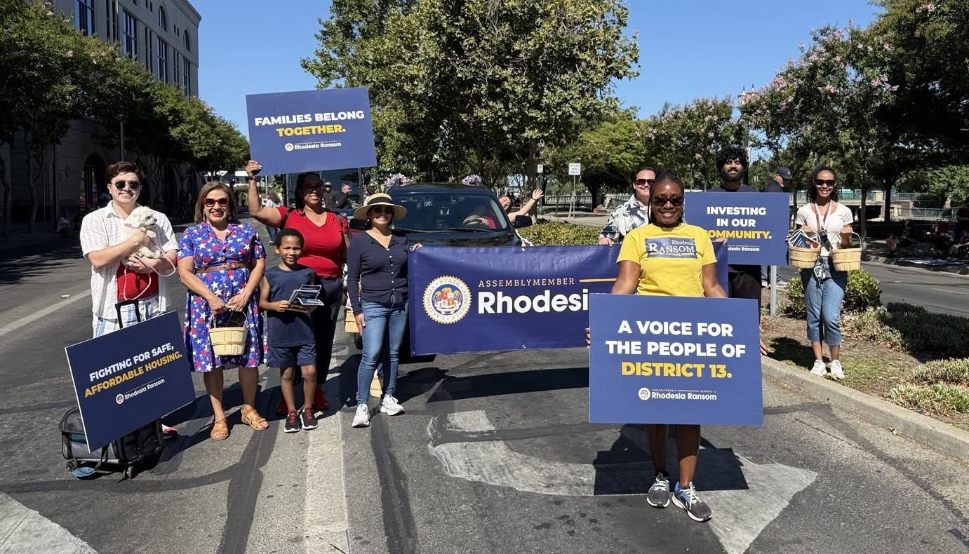 Assemblymember Rhodesia Ransom and volunteers walking in the 2025 City of Stockton 4th of July Parade.