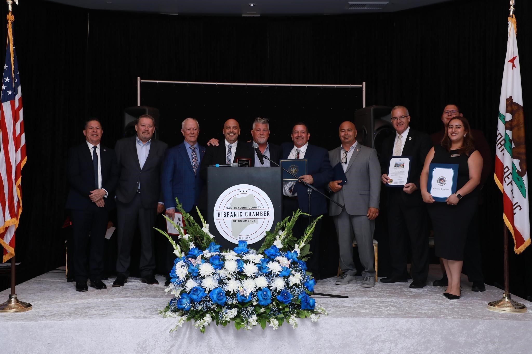 Assemblymember Rhodesia Ransom's staff and other county leaders on stage at the 53rd annual Hispanic Chamber of Commerce Business Awards & Installation Gala