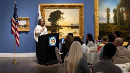 Guest speaker addressing crowd