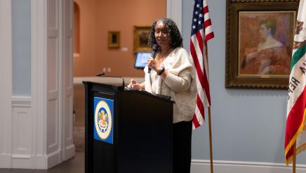 Guest speaker addressing crowd