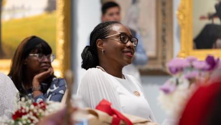 Assemblymember Rhodesia Ransom enjoying poem from guest speaker