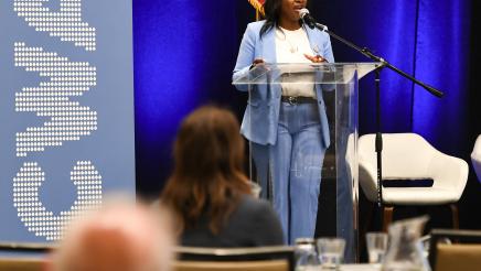Assemblymember Rhodesia Ransom addressing attendees as a guest speaker at the California Water Association Symposium, The Price of a Drop.