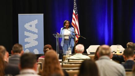 Assemblymember Rhodesia Ransom addressing attendees as a guest speaker at the California Water Association Symposium, The Price of a Drop.