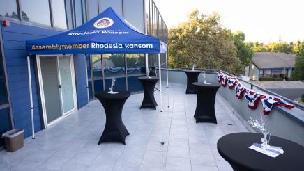 Event patio setup welcoming guests to Assemblymember Rhodesia Ransom’s Stockton district office Open House