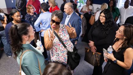 Community members networking and enjoying Assemblymember Rhodesia Ransom’s Open House in Stockton, California