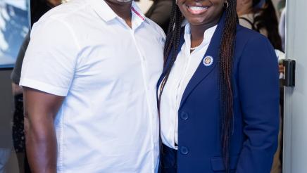 Assemblymember Rhodesia Ransom and her husband standing together during District 13 Open House celebration