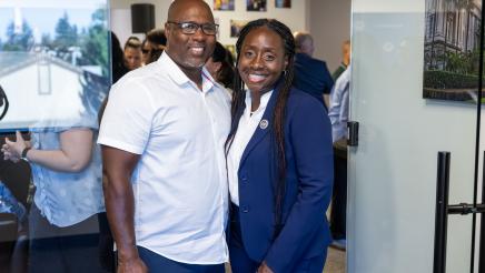 Assemblymember Rhodesia Ransom and her husband standing together during District 13 Open House celebration