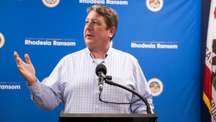 Stockton Chamber of Commerce CEO Timm Quinn speaking at Assemblymember Rhodesia Ransom’s District 13 Open House ceremony in Stockton, California