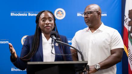 Assemblymember Rhodesia Ransom and her husband standing together during District 13 Open House celebration