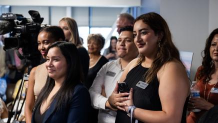 Assemblymember Rhodesia Ransom staff during her opening remarks.