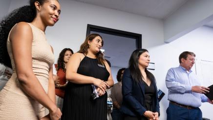 Assemblymember Rhodesia Ransom staff during her opening remarks.
