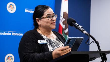 San Joaquin County Hispanic Chamber of Commerce CEO giving remarks at Assemblymember Rhodesia Ransom’s District 13 Open House in Stockton, California