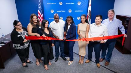 Assemblymember Rhodesia Ransom with her staff, Stockton Chamber of Commerce CEO, and San Joaquin County Hispanic Chamber of Commerce CEO during ribbon cutting ceremony at District 13 Open House in District 13.