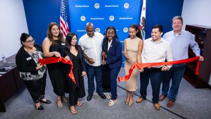Assemblymember Rhodesia Ransom with her staff, Stockton Chamber of Commerce CEO, and San Joaquin County Hispanic Chamber of Commerce CEO during ribbon cutting ceremony at District 13 Open House in District 13.