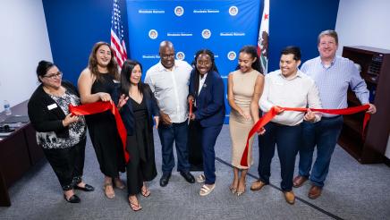 Assemblymember Rhodesia Ransom with her staff, Stockton Chamber of Commerce CEO, and San Joaquin County Hispanic Chamber of Commerce CEO during ribbon cutting ceremony at District 13 Open House in District 13.