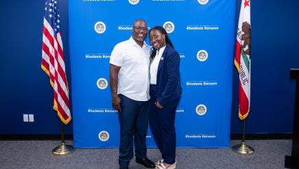 Assemblymember Rhodesia Ransom and her husband standing together during District 13 Open House celebration